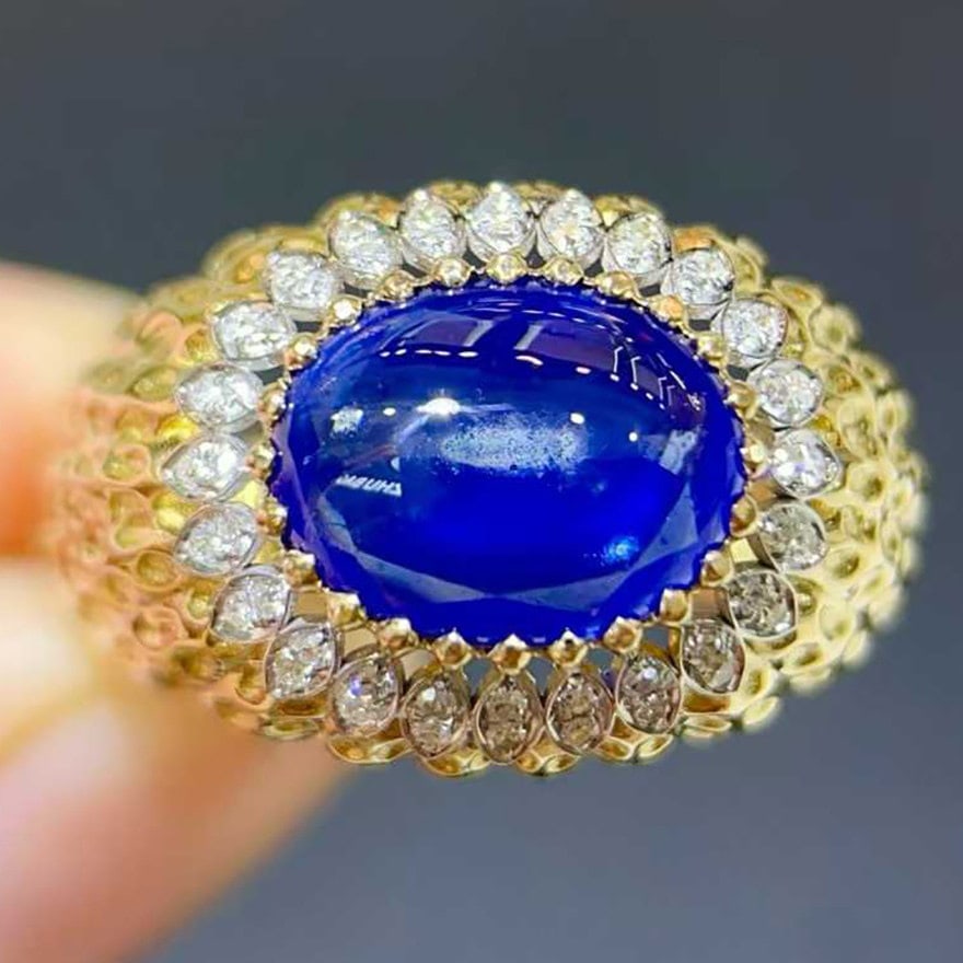 14k Gold 2.62 Ctw Natural Sapphire & Diamond Ring: Ref:231126013 // gold content:14k gold // ring size:7. 25us // // main gemstone:sapphire // shape:oval // carat weight:2. 49ct // color:blue // treatment:natural // // adjacent gemstone 2 : diamond //
