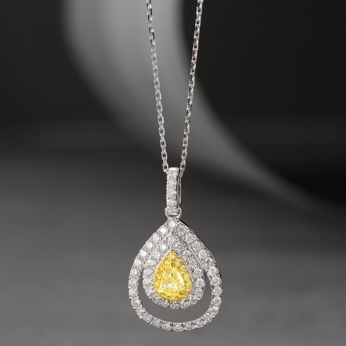 14k Gold 0.59 Ctw Natural Yellow Diamond & Diamond Necklace: Ref:231126021 // gold content:14k gold // main gemstone:yellow diamond // shape:pear // carat weight:0. 18ct // color:yellow // treatment:natural // // adjacent gemstone 2 : diamond // shape:round //