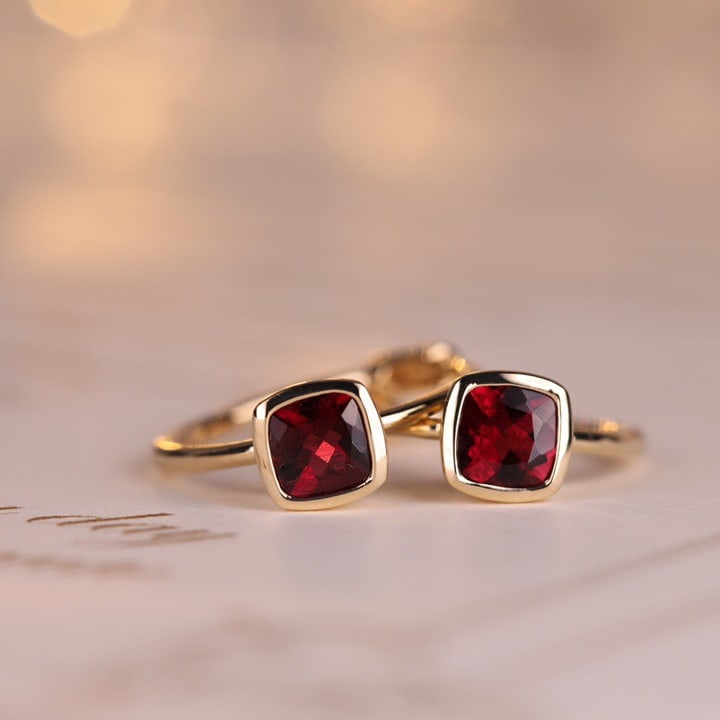 14k Gold 0.46 Ct Natural Tourmaline Earrings: Ref:231126159 // gold content:14k gold // main gemstone:tourmaline // shape:cushion // carat weight:0. 46ct // color:red // treatment:natural // Low Estimate: 1500Condition: NewHigh Estimate: 2300