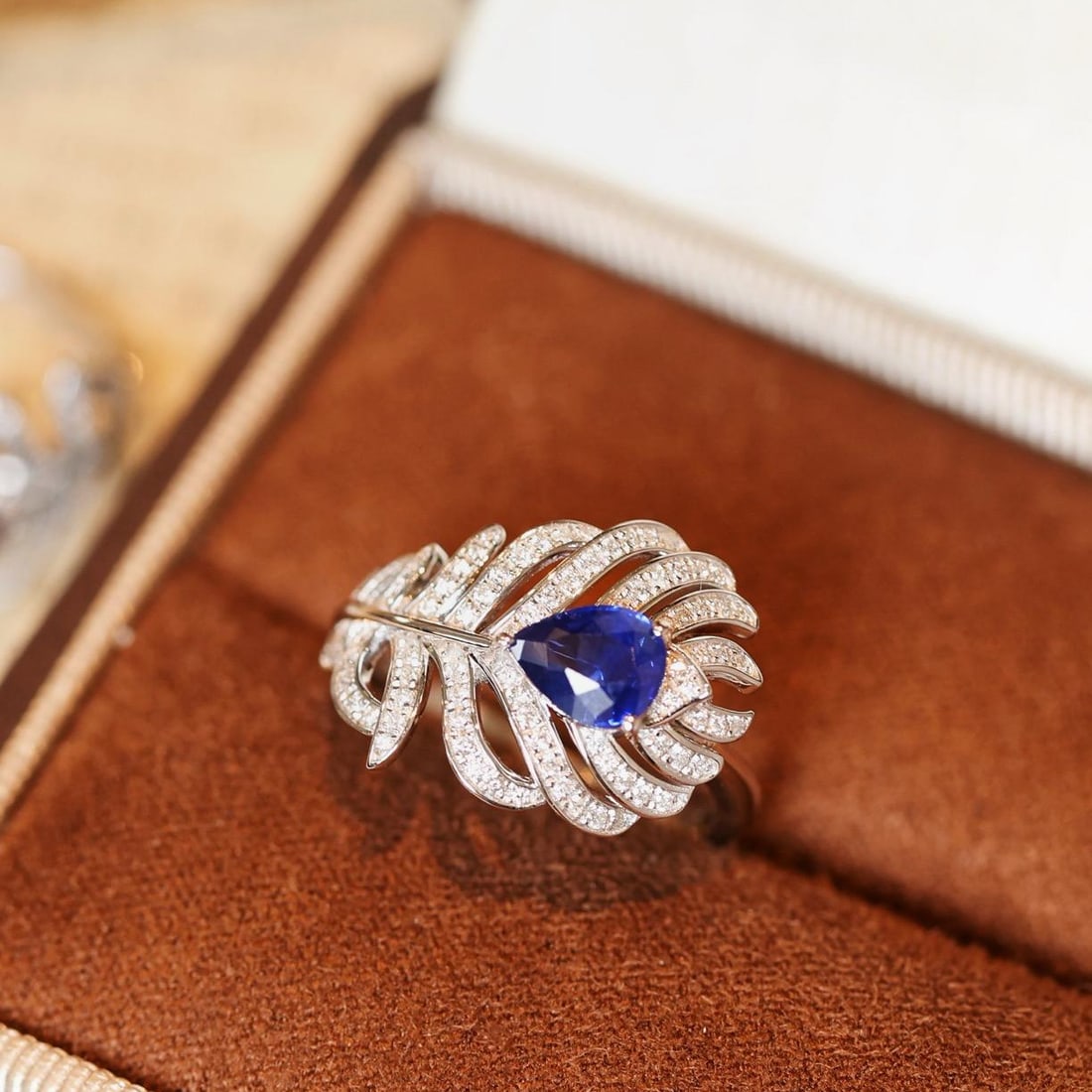 14k Gold 1.26 Ctw Vivid Blue Natural Sapphire & Diamond Ring: Ref:231126180 // gold content:14k gold // ring size:7. 25us // // main gemstone:sapphire // shape:pear // carat weight:0. 9ct // color:vivid blue // treatment:natural // // adjacent gemstone 2 :