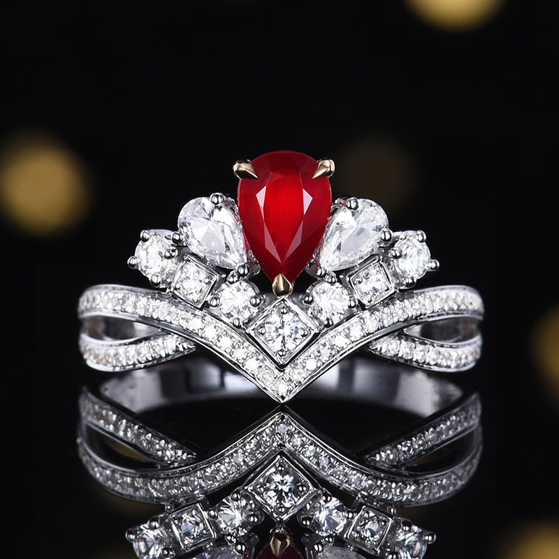14k Gold 0.71 Ctw Natural Ruby & Diamond Ring: Ref:231126184 // gold content:14k gold // ring size:7. 25us // // main gemstone:ruby // shape:pear // carat weight:0. 56ct // color:pigeonblood red // treatment:natural // // adjacent gemstone 2 : dia