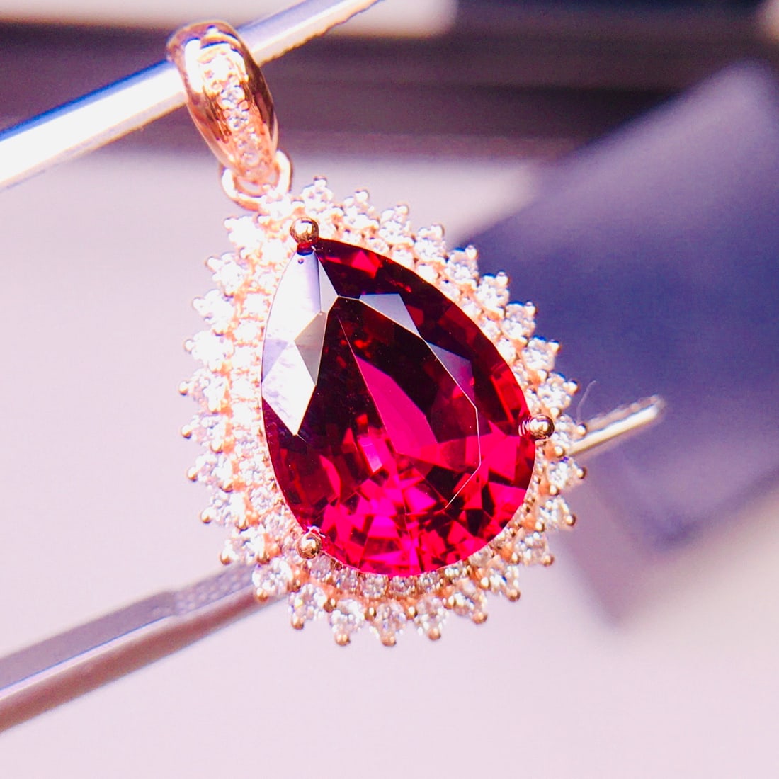 14k Gold 5.5 Ct Natural Tourmaline & Diamond Pendant( Without Chain ): Ref:231126203 // gold content:14k gold // main gemstone:tourmaline // shape:pear // carat weight:5. 5ct // color:red // treatment:natural // // adjacent gemstone 2 : diamond // shape:round // clarity