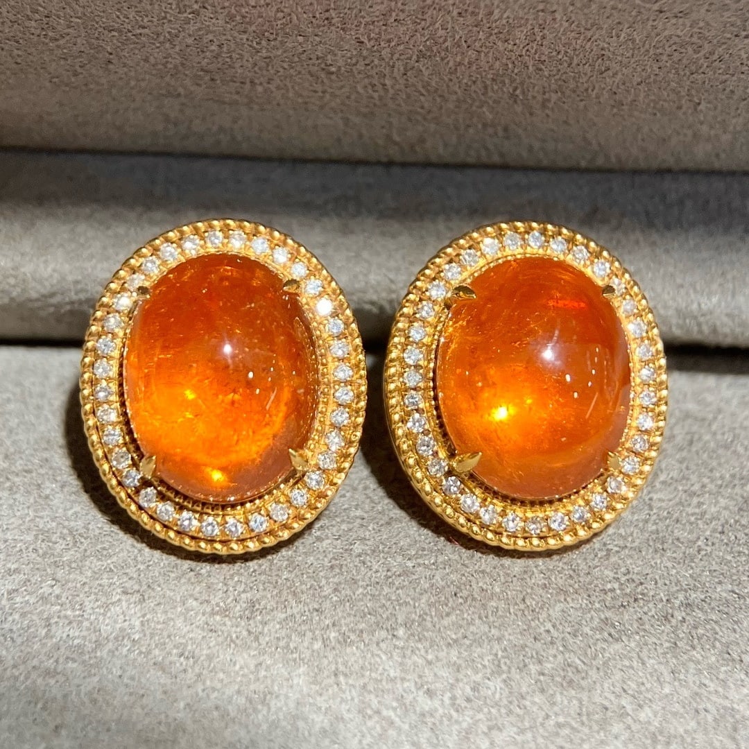 14k Gold 8.84 Ctw Natural Spessartine & Diamond Earrings: Ref:231126290 // gold content:14k gold // main gemstone:spessartine // shape:oval // carat weight:8. 58ct // color:orange // treatment:natural // // adjacent gemstone 2 : diamond // shape:round // car