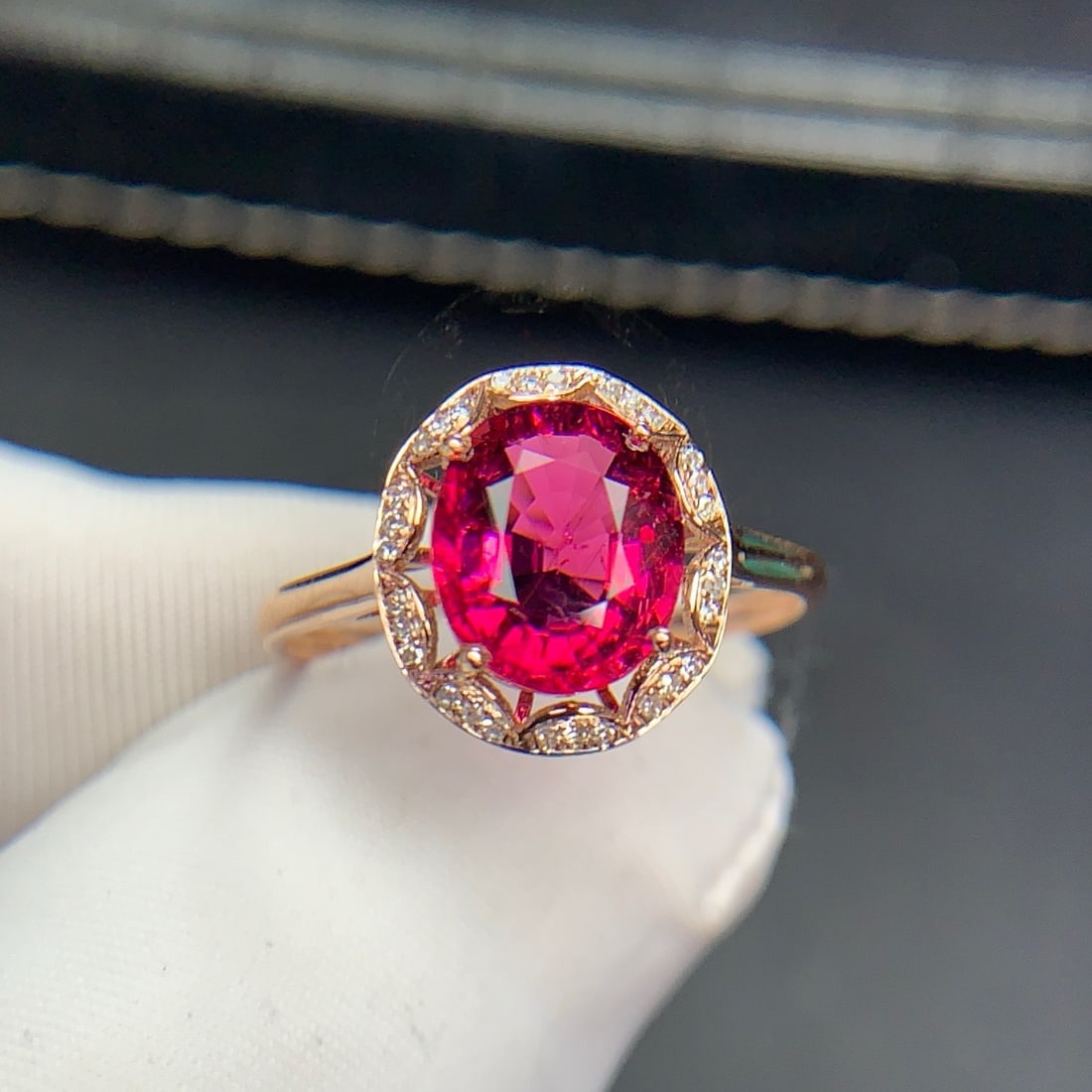 14k Gold 2.3 Ct Natural Tourmaline & Diamond Ring: Ref:231126302 // gold content:14k gold // ring size:7. 25us // // main gemstone:tourmaline // shape:oval // carat weight:2. 3ct // color:red // treatment:natural // // adjacent gemstone 2 : diamond //