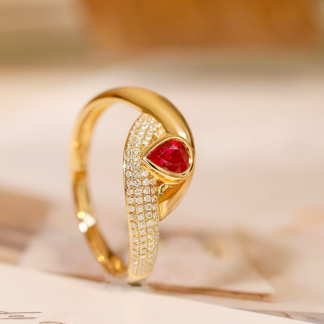 14k Gold 0.69 Ctw Vivid Red Natural Ruby & Diamond Ring: Ref:231126303 // gold content:14k gold // ring size:7. 25us // // main gemstone:ruby // shape:pear // carat weight:0. 53ct // color:vivid red // treatment:natural // // adjacent gemstone 2 : diamond /