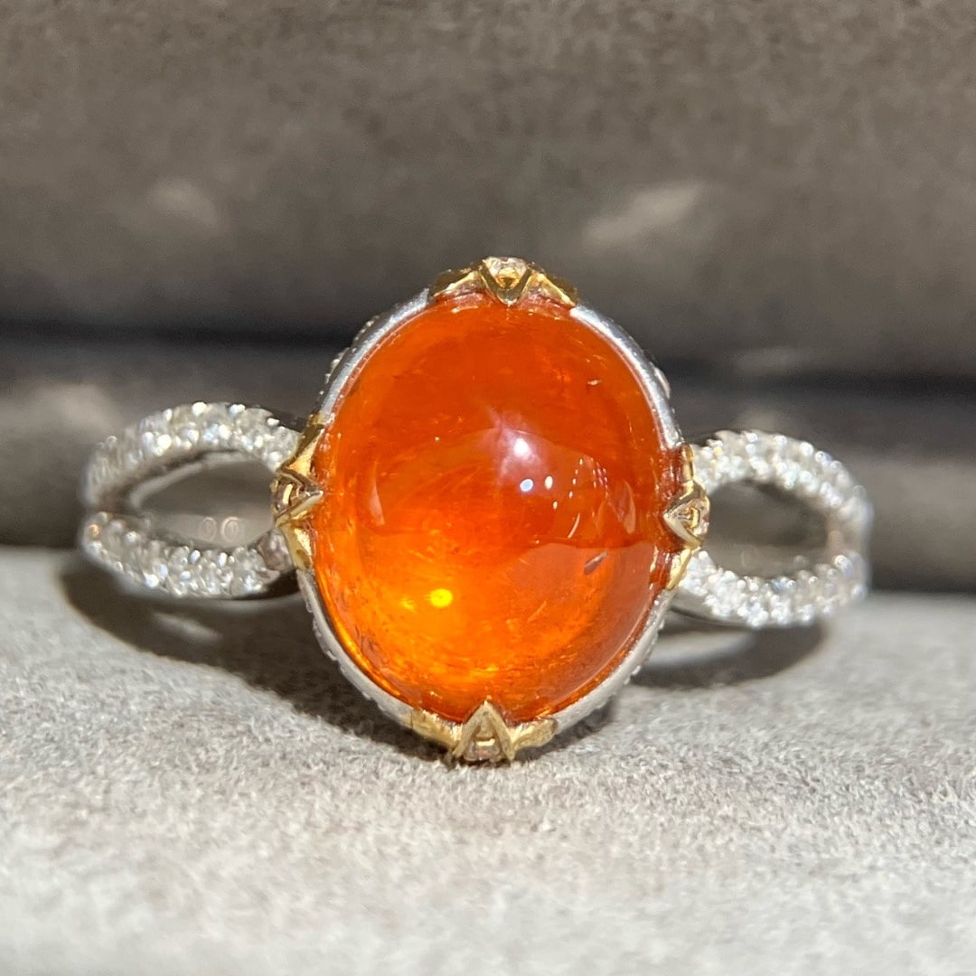 14k Gold 4.66 Ctw Natural Spessartine & Diamond Ring: Ref:231126331 // gold content:14k gold // ring size:7. 25us // // main gemstone:spessartine // shape:oval // carat weight:4. 36ct // color:orange // treatment:natural // // adjacent gemstone 2 : diamo