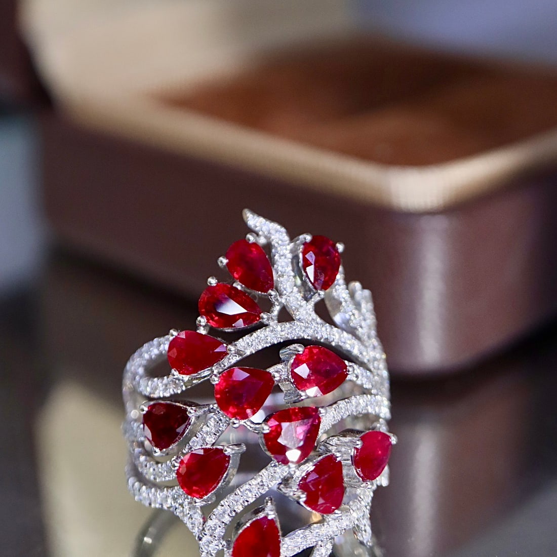 14k Gold 4.35 Ctw Vivid Red Natural Ruby & Diamond Ring: Ref:231126339 // gold content:14k gold // ring size:7. 25us // // main gemstone:ruby // shape:pear // carat weight:3. 60ct // color:vivid red // treatment:natural // // adjacent gemstone 2 :