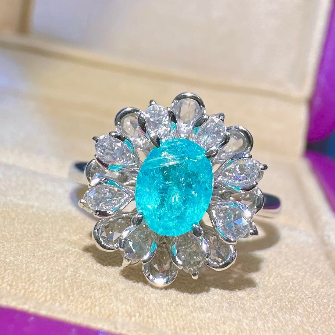 14k Gold 1.21 Ctw Natural Paraiba Tourmaline & Diamond Ring: Ref:231126361 // gold content:14k gold // ring size:7. 25us // // main gemstone:paraiba tourmaline // shape:oval // carat weight:0. 62ct // color:blue // treatment:natural // // adjacent gemstone 2 :