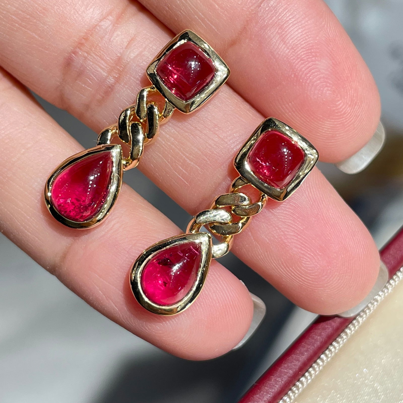 14k Gold 5.70 Ct Natural Tourmaline Earrings: Ref:231126412 // gold content:14k gold // main gemstone:tourmaline // shape:multiple // carat weight:5. 70ct // color:red // treatment:natural // High Estimate: 6400Condition: NewLow Estimate: 4300