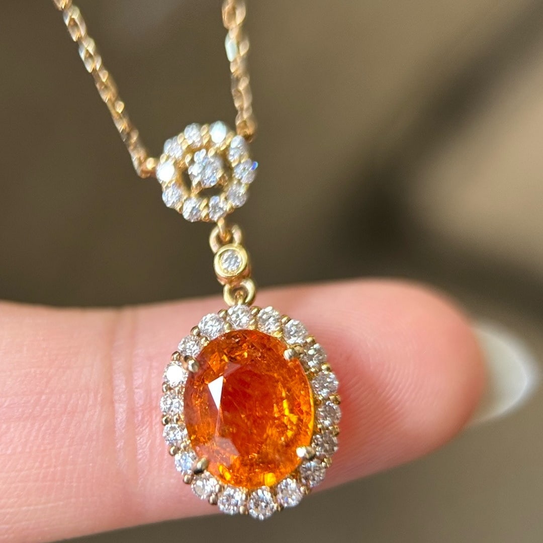 14k Gold 3.31 Ctw Natural Spessartine & Diamond Necklace: Ref:231126422 // gold content:14k gold // main gemstone:spessartine // shape:oval // carat weight:2. 90ct // color:orange // treatment:natural // // adjacent gemstone 2 : diamond // shape:round //