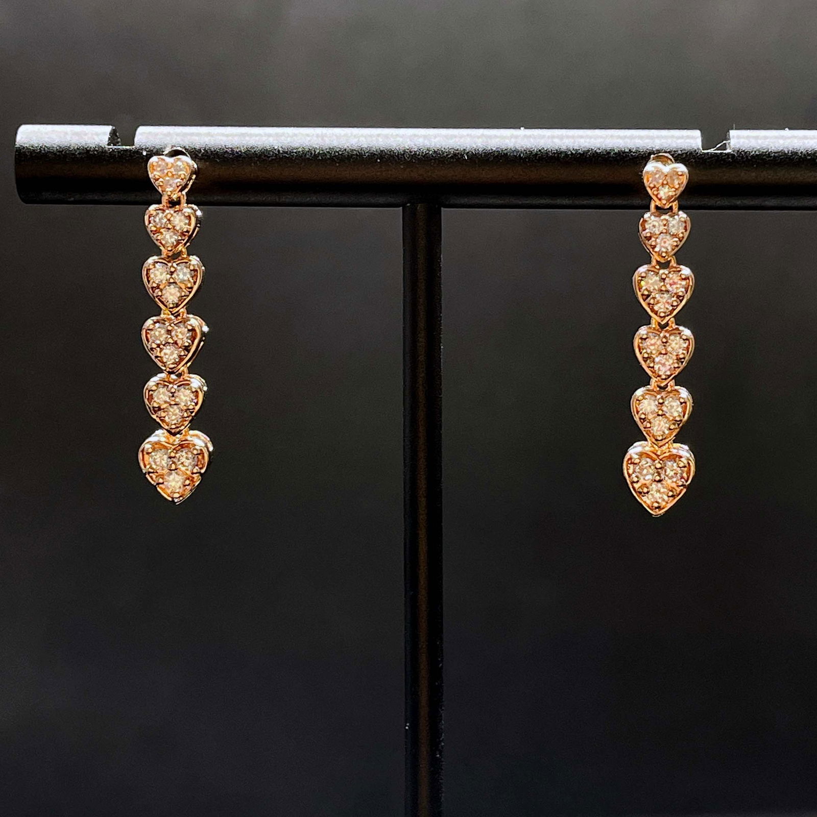 14k Gold 0.5 Ct Natural Diamond Earrings: Ref:230794046 // gold content:14k gold // main gemstone:diamond // shape:round // carat weight:0. 5ct // color:pink // treatment:natural // cut grade:g // Condition: NewLow Estimate: 1800.00High