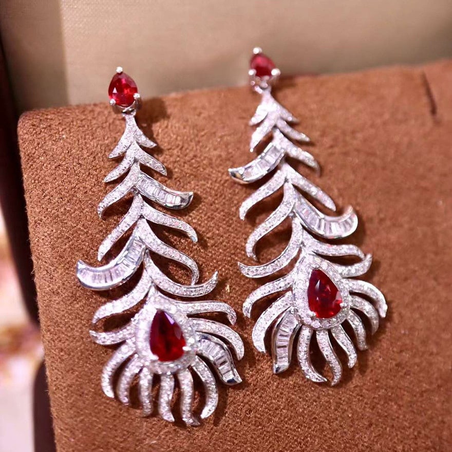 14k Gold 3.13 Ctw Natural Ruby & Diamond Earrings: Ref:231139033 // gold content:14k gold // main gemstone:ruby // shape:pear // carat weight:1. 58ct // color:red // treatment:natural // // adjacent gemstone 2 : diamond // shape:multiple // carat