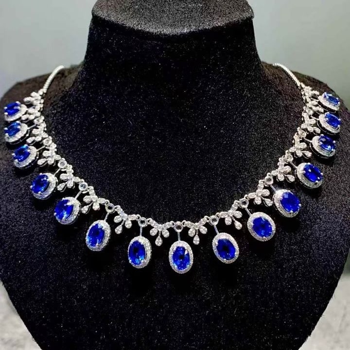 14k Gold 9.3 Ct Natural Sapphire & Diamond & Sapphire Necklace: Ref:231139034 // gold content:14k gold // main gemstone:sapphire // shape:oval // carat weight:9. 3ct // color:blue // treatment:natural // // adjacent gemstone 2 : diamond // shape:round //