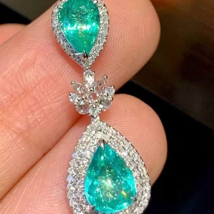 14k Gold 1.6 Ct Natural Paraiba Tourmaline & Diamond & Sapphire Pendant( Without Chain ): Ref:231139104 // gold content:14k gold // main gemstone:paraiba tourmaline // shape:pear // carat weight:1. 6ct // color:bluish green // treatment:natural // // adjacent gemstone 2 : diamond // shape: