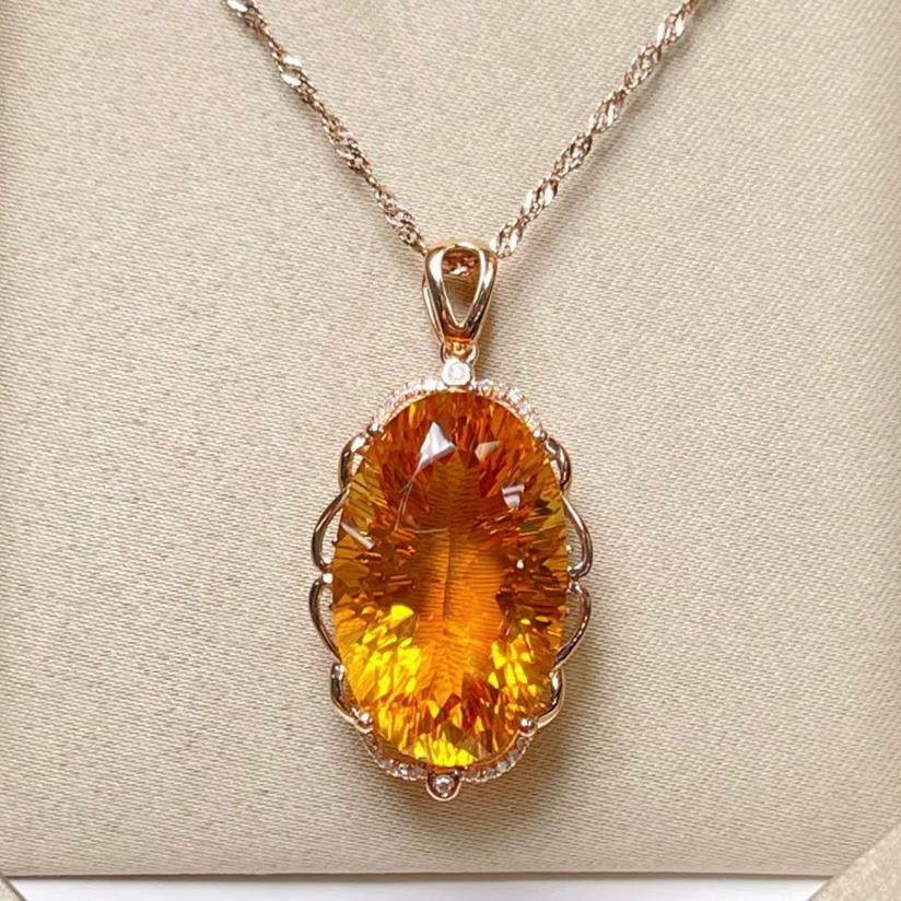 14k Gold 19.02 Ctw Natural Citrine & Diamond Pendant( Without Chain ): Ref:231139118 // gold content:14k gold // main gemstone:citrine // shape:oval // carat weight:18. 95ct // color:yellow // treatment:natural // // adjacent gemstone 2 : diamond // number of