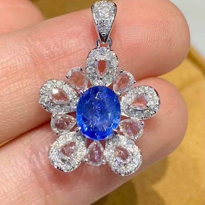 14k Gold 1.2 Ct Natural Sapphire & Diamond & Sapphire Pendant( Without Chain ): Ref:231139167 // gold content:14k gold // main gemstone:sapphire // shape:oval // carat weight:1. 2ct // color:blue // treatment:natural // // adjacent gemstone 2 : diamond // shape:round //