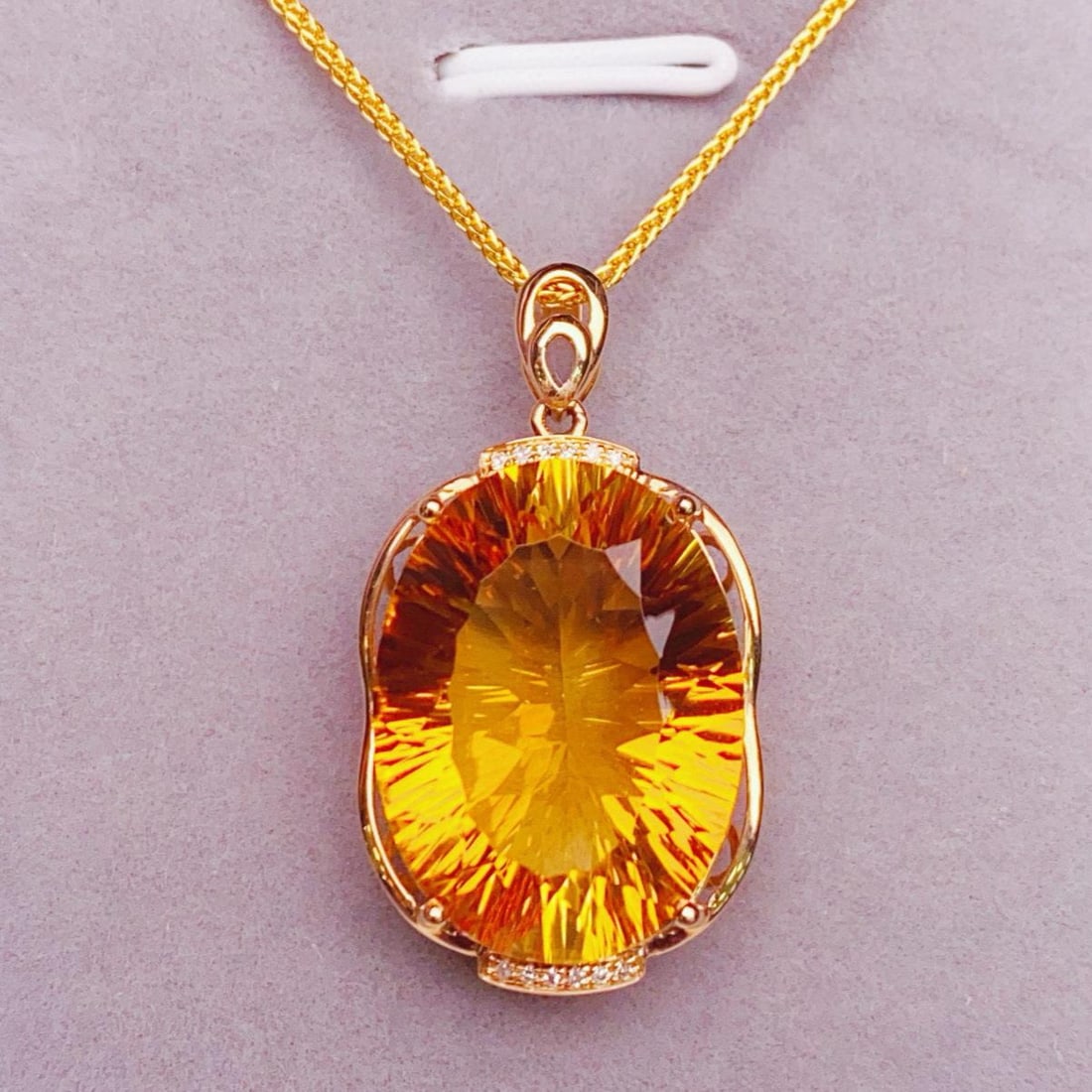 14k Gold 15.08 Ctw Natural Citrine & Diamond Pendant( Without Chain ): Ref:231139203 // gold content:14k gold // main gemstone:citrine // shape:oval // carat weight:15. 05ct // color:yellow // treatment:natural // // adjacent gemstone 2 : diamond // number of stones:12 /