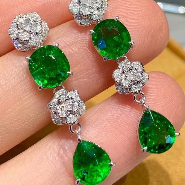 14k Gold 5.05 Ct Natural Tsavorite & Diamond Earrings: Ref:231139210 // gold content:14k gold // main gemstone:tsavorite // shape:multiple // carat weight:5. 05ct // color:green // treatment:natural // // adjacent gemstone 2 : diamond // shape:round //