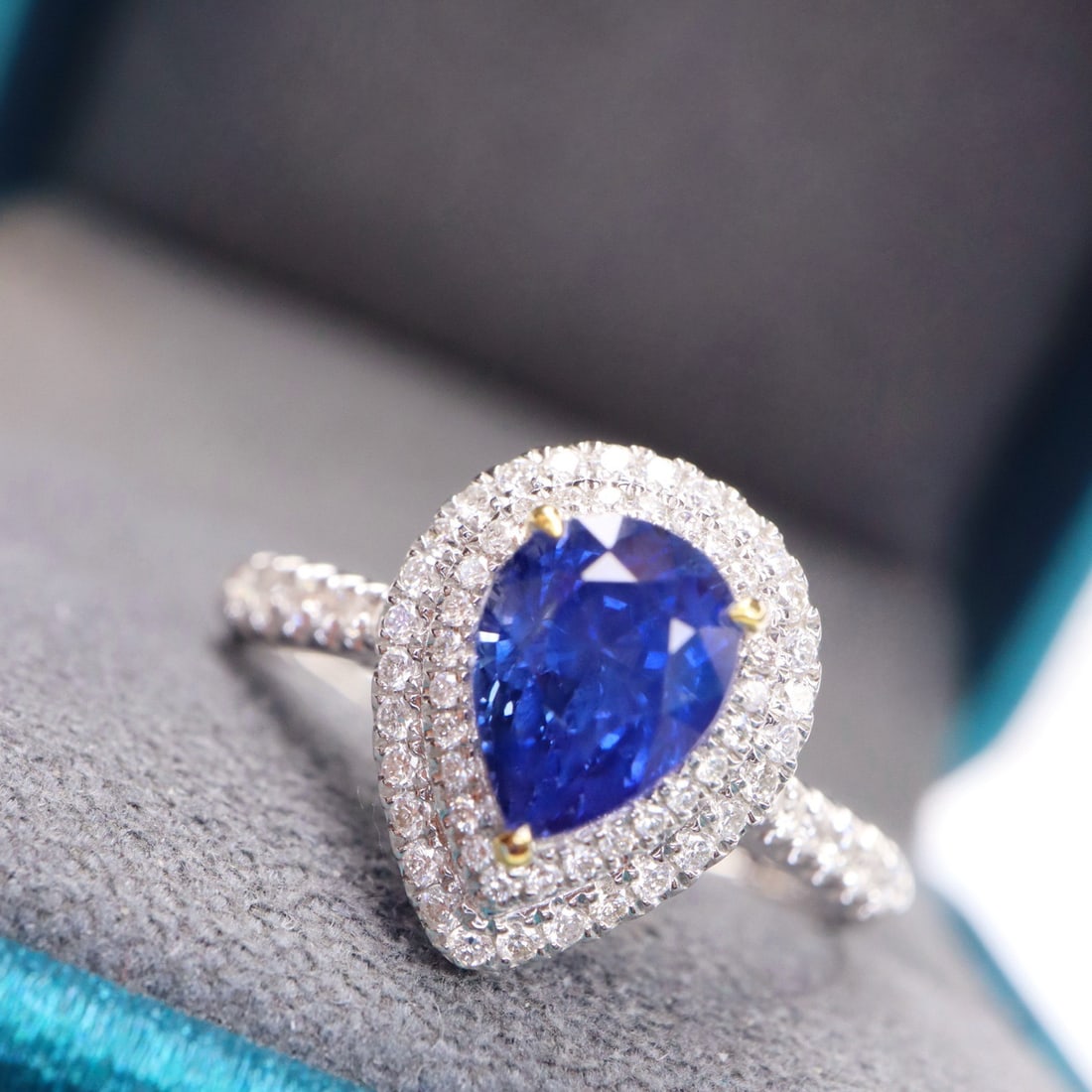 14k Gold 2.04 Ctw Natural Sapphire & Diamond Ring: Ref:231140045 // gold content:14k gold // ring size:7. 25us // // main gemstone:sapphire // shape:pear // carat weight:1. 69ct // color:blue // treatment:natural // // adjacent gemstone 2 :