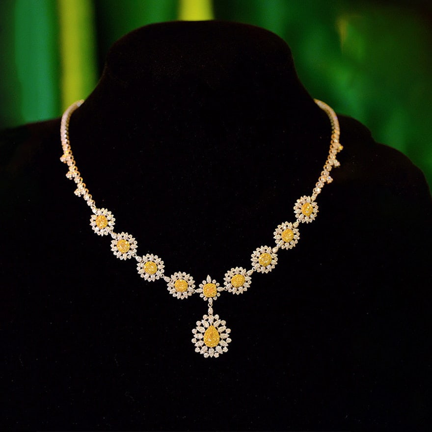 14k Gold 6.3 Ct Natural Color Diamond Necklace: Ref:231140051 // gold content:14k gold // main gemstone:diamond // shape:multiple // carat weight:6. 3ct // clarity grade:vs-si // color:color // treatment:natural // Condition: NewLow Estimate: