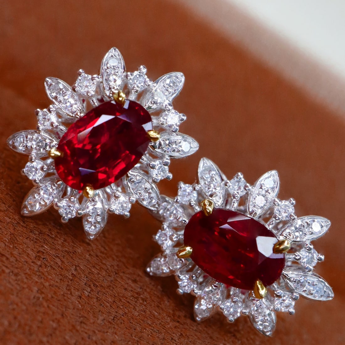 14k Gold 1.17 Ctw Vivid Red Natural Ruby & Diamond Earrings: Ref:231140143 // gold content:14k gold // main gemstone:ruby // shape:oval // carat weight:0. 88ct // color:vivid red // treatment:natural // // adjacent gemstone 2 : diamond // shape:round // carat w