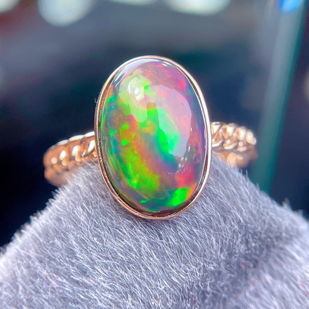 14k Gold 3.7 Ct Natural Opal Ring: Ref:231140147 // gold content:14k gold // ring size:7. 25us // // main gemstone:opal // shape:oval // carat weight:3. 7ct // color:color // treatment:natural // Condition: NewLow Estimate: