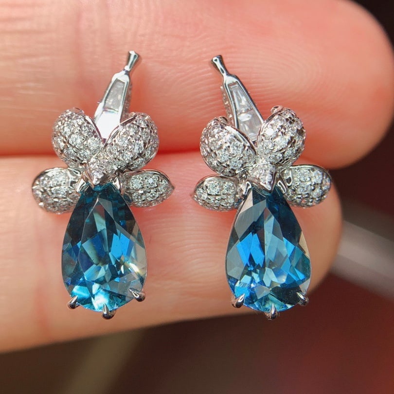 14k Gold 2.84 Ctw Natural Aquamarine & Diamond Earrings: Ref:231140183 // gold content:14k gold // main gemstone:aquamarine // shape:pear // carat weight:2. 33ct // color:santa maria color // treatment:natural // // adjacent gemstone 2 : diamond // shape:mu