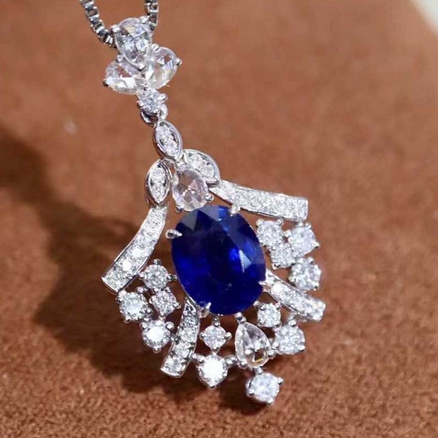 14k Gold 2.28 Ctw Natural Sapphire & Diamond Pendant( Without Chain ): Ref:231140213 // gold content:14k gold // main gemstone:sapphire // shape:oval // carat weight:1. 70ct // color:blue // treatment:natural // // adjacent gemstone 2 : diamond // shape:multiple // carat