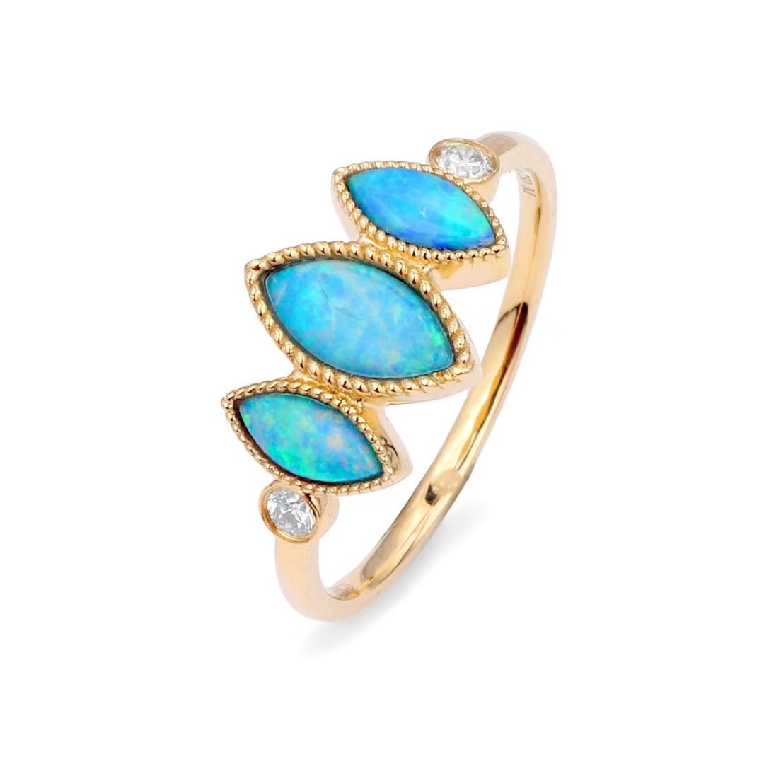 14k Gold 0.66 Ctw Natural Opal & Diamond Ring: Ref:231140214 // gold content:14k gold // ring size:7. 25us // // main gemstone:opal // shape:marquise // carat weight:0. 58ct // color:color // treatment:natural // // adjacent gemstone 2 :