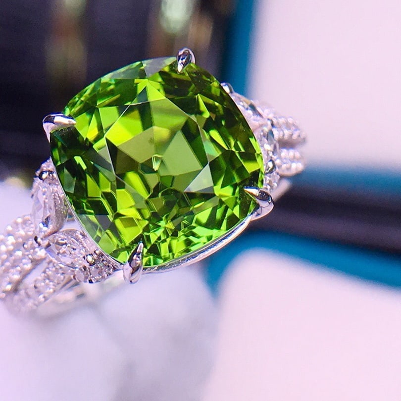 14k Gold 7.1 Ct Natural Tourmaline & Diamond Ring: Ref:231140222 // gold content:14k gold // ring size:7. 25us // // main gemstone:tourmaline // shape:cushion // carat weight:7. 1ct // color:green // treatment:natural // // adjacent gemstone 2 : diamo