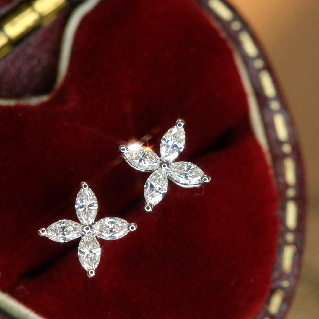 14k Gold 0.36 Ct Natural H Diamond Earrings: Ref:231140245 // gold content:14k gold // main gemstone:diamond // shape:marquise // carat weight:0. 36ct // clarity grade:vs-si // color:h // treatment:natural // Condition: NewLow Estimate: