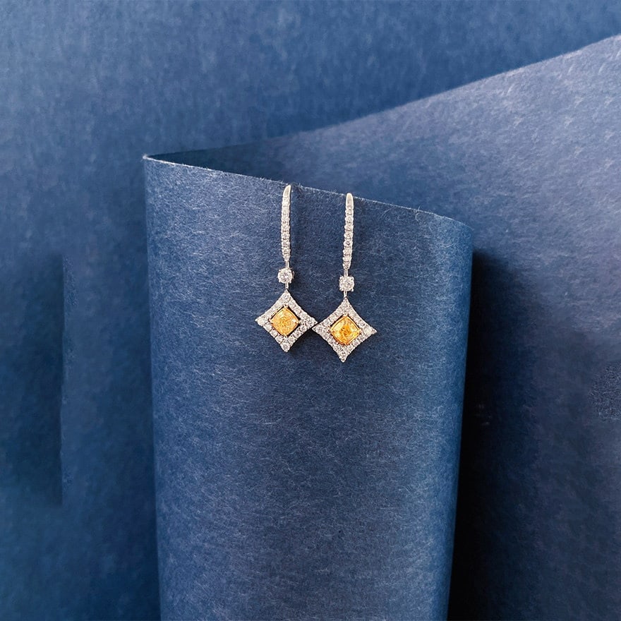 14k Gold 0.70 Ct Natural Color Diamond Earrings: Ref:231140270 // gold content:14k gold // main gemstone:diamond // shape:multiple // carat weight:0. 70ct // clarity grade:vs-si // color:color // treatment:natural // Condition: New Low Estimate: 44