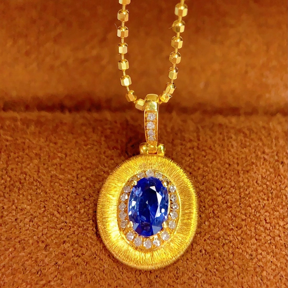 14k Gold 0.8 Ct Natural Sapphire & Diamond Pendant( Without Chain ): Ref:231140333 // gold content:14k gold // main gemstone:sapphire // shape:oval // carat weight:0. 8ct // color:blue // treatment:natural // // adjacent gemstone 2 : diamond // number of stones:24