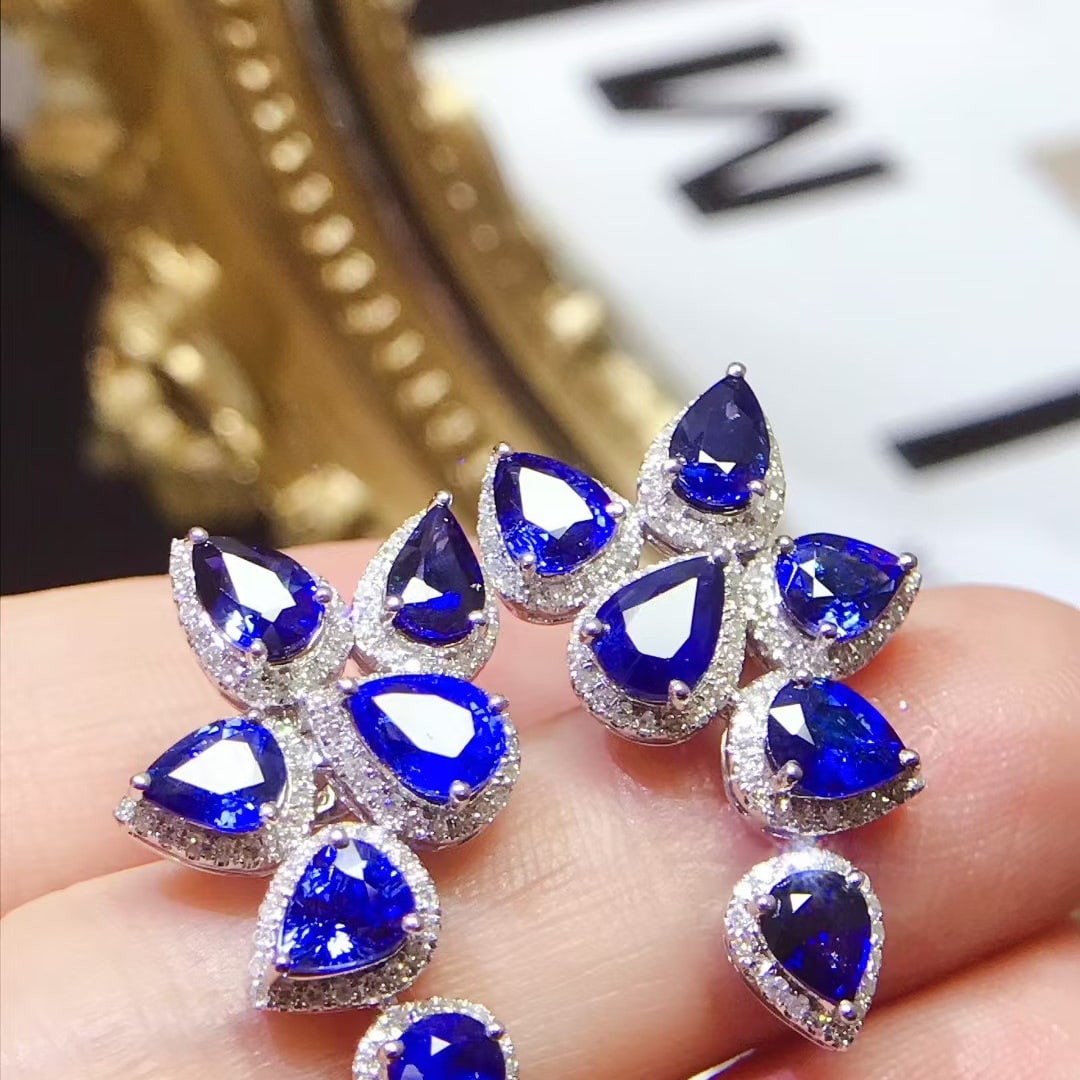 14k Gold 6.37 Ctw Natural Sapphire & Diamond Earrings: Ref:231140367 // gold content:14k gold // main gemstone:sapphire // shape:pear // carat weight:5. 7ct // color:blue // treatment:natural // // adjacent gemstone 2 : diamond // shape:round // carat