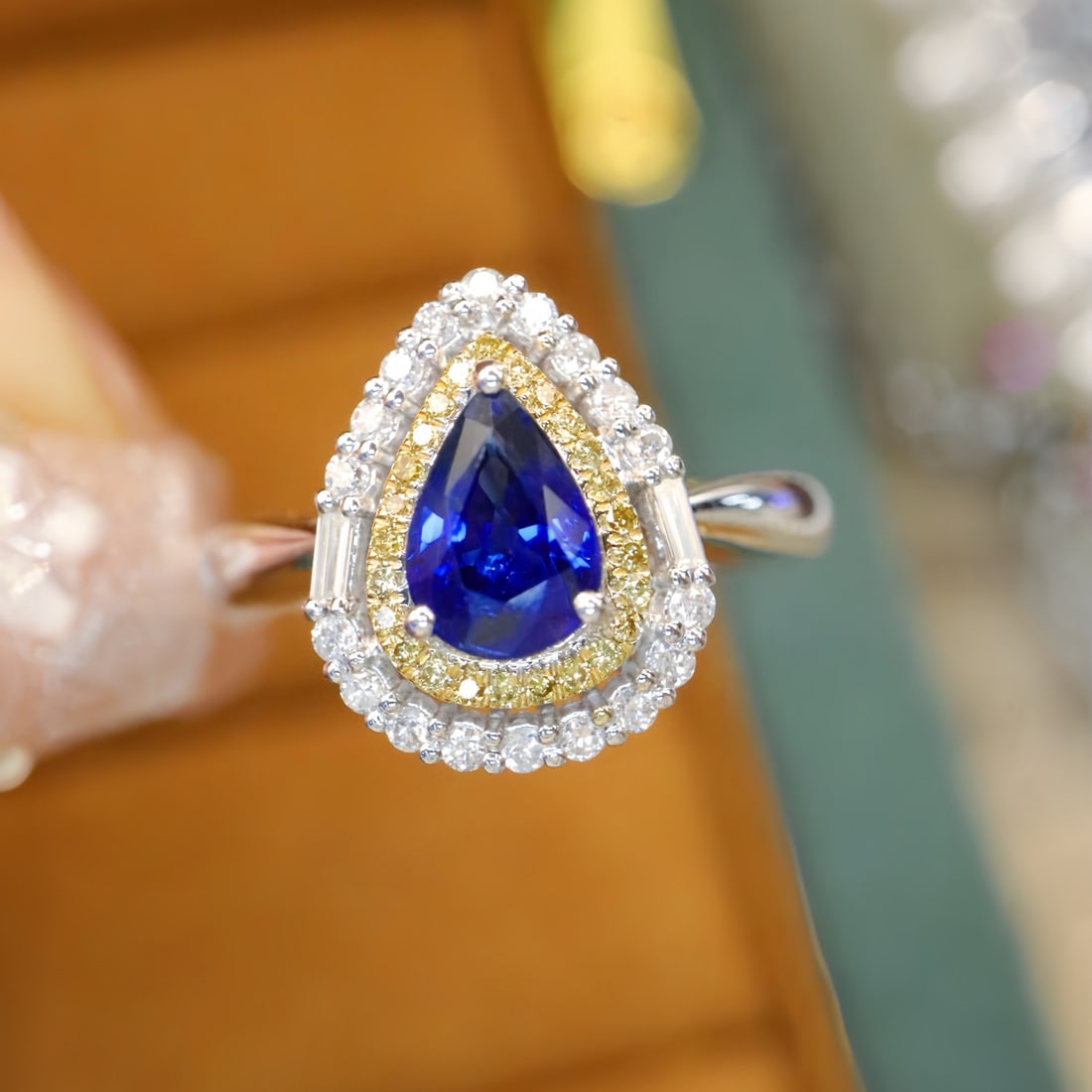 14k Gold 1.19 Ctw Natural Sapphire & Diamond Ring: Ref:231140389 // gold content:14k gold // ring size:7. 25us // // main gemstone:sapphire // shape:pear // carat weight:0. 90ct // color:blue // treatment:natural // // adjacent gemstone 2 :