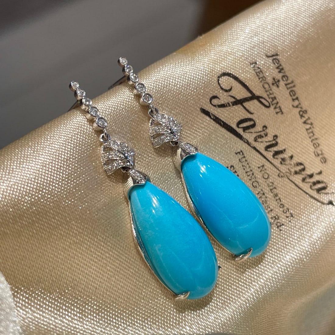 14k Gold 12.63 Ct Natural Blue Turquoise & Diamond Earrings: Ref:231140444 // gold content:14k gold // main gemstone:blue turquoise // shape:pear // carat weight:12. 63ct // color:blue // treatment:natural // // adjacent gemstone 2 : diamond // shape:round