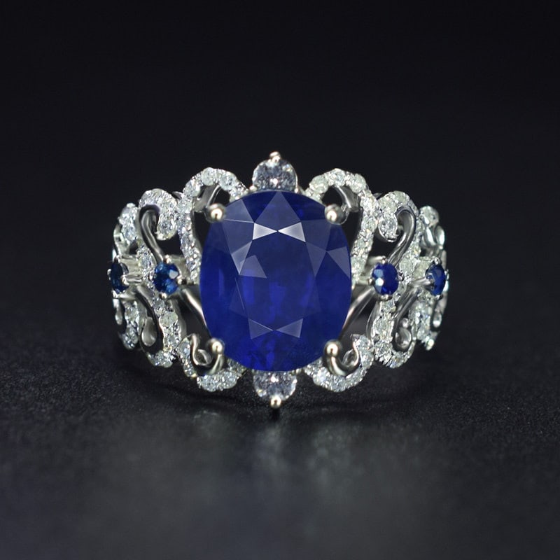14k Gold 3.30 Ctw Natural Sapphire & Sapphire Ring: Ref:231143032 // gold content:14k gold // ring size:7. 25us // // main gemstone:sapphire // shape:oval // carat weight:3. 13ct // color:blue // treatment:natural // // adjacent gemstone 2 :