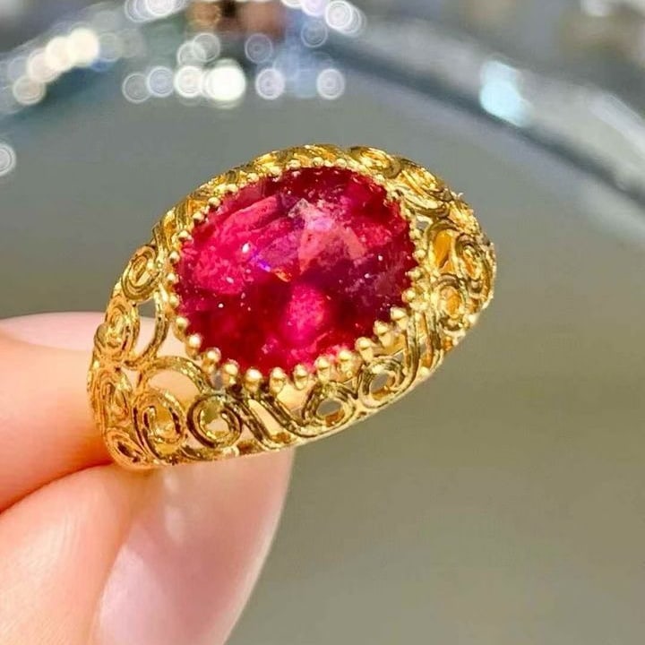 14k Gold 3.6 Ct Natural Tourmaline Ring: Ref:231143060 // gold content:14k gold // ring size:7. 25us // // main gemstone:tourmaline // shape:oval // carat weight:3. 6ct // color:red // treatment:natural // High Estimate: 6300Condition:
