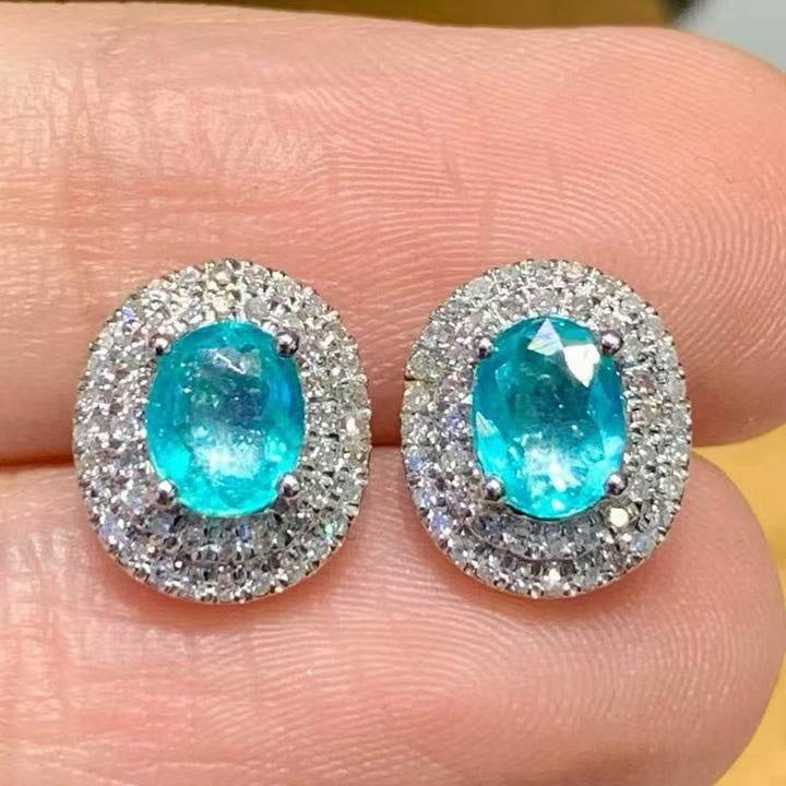 14k Gold 0.8 Ct Natural Paraiba Tourmaline & Diamond Earrings: Ref:231143062 // gold content:14k gold // main gemstone:paraiba tourmaline // shape:oval // carat weight:0. 8ct // color:blue // treatment:natural // // adjacent gemstone 2 : diamond // shape:round