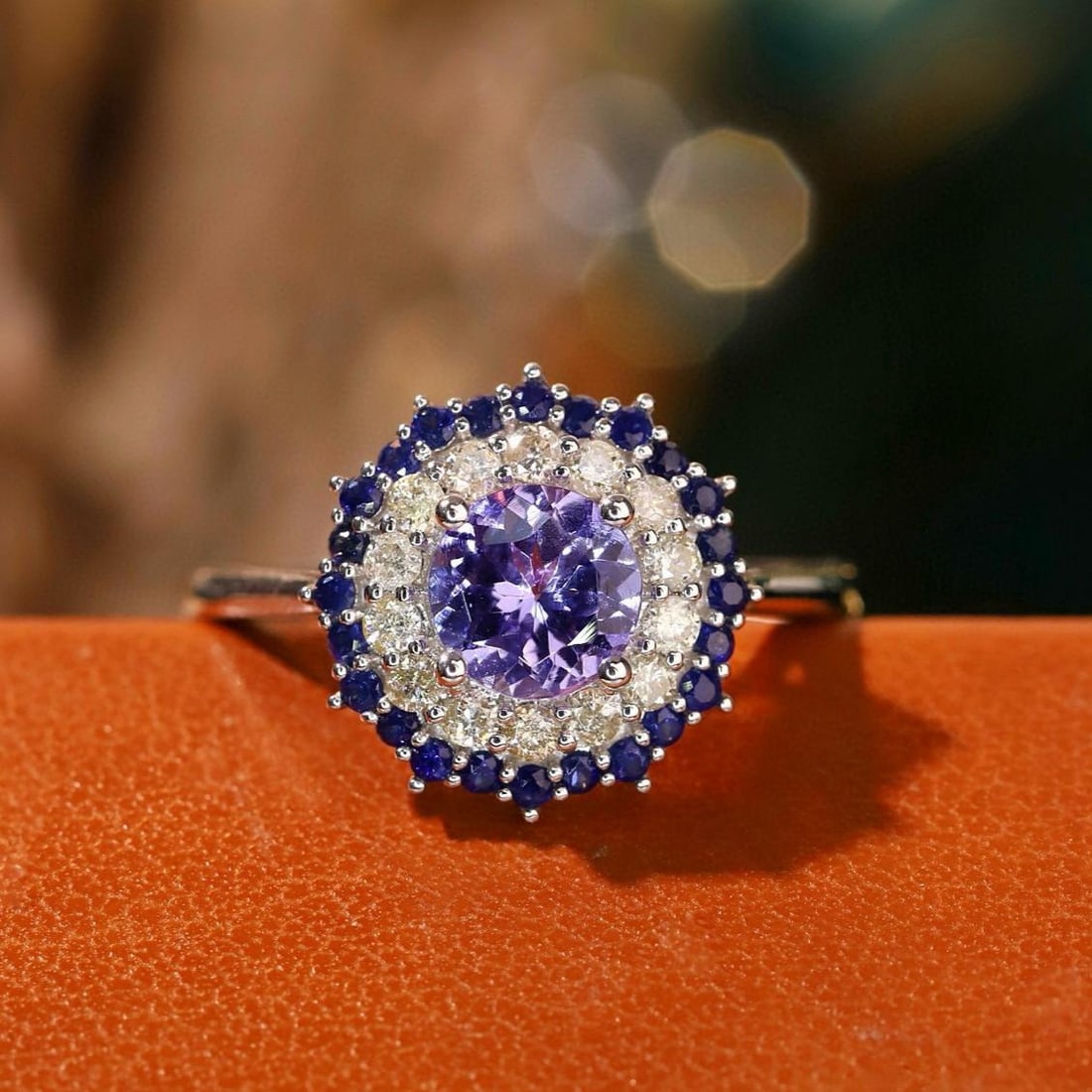 14k Gold 1.06 Ctw Natural Tanzanite & Diamond Ring: Ref:231143066 // gold content:14k gold // ring size:7. 25us // // main gemstone:tanzanite // shape:round // carat weight:0. 76ct // color:blue // treatment:natural // cut grade:g // // adjacent