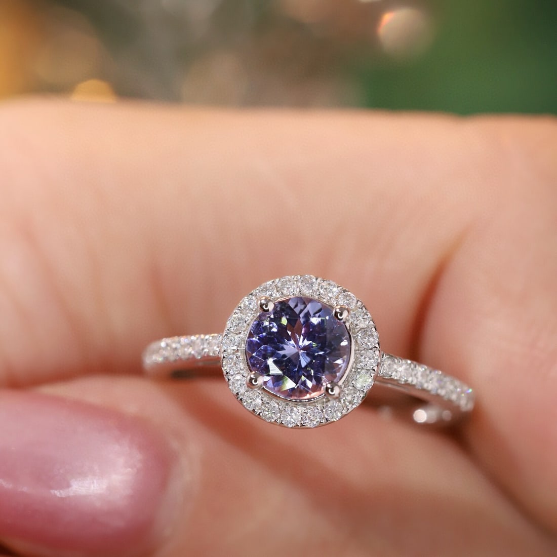 14k Gold 1.10 Ctw Natural Tanzanite & Diamond Ring: Ref:231143115 // gold content:14k gold // ring size:7. 25us // // main gemstone:tanzanite // shape:round // carat weight:0. 85ct // color:blue // treatment:natural // cut grade:g // // adjacent