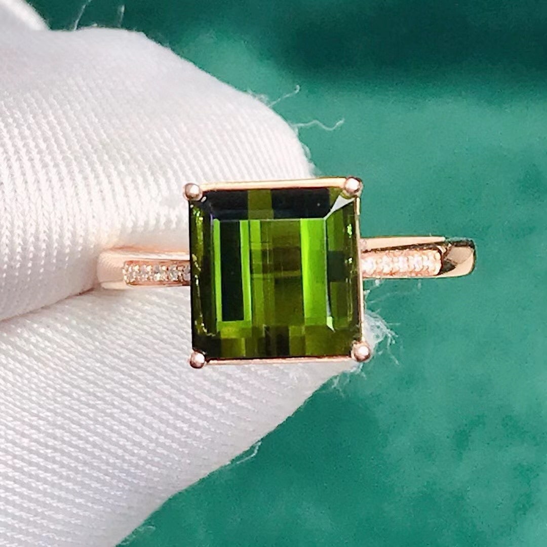 14k Gold 3.43 Ctw Natural Tourmaline & Diamond Ring: Ref:231143119 // gold content:14k gold // ring size:7. 25us // // main gemstone:tourmaline // shape:octagonal // carat weight:3. 4ct // color:green // treatment:natural // // adjacent gemstone 2 :