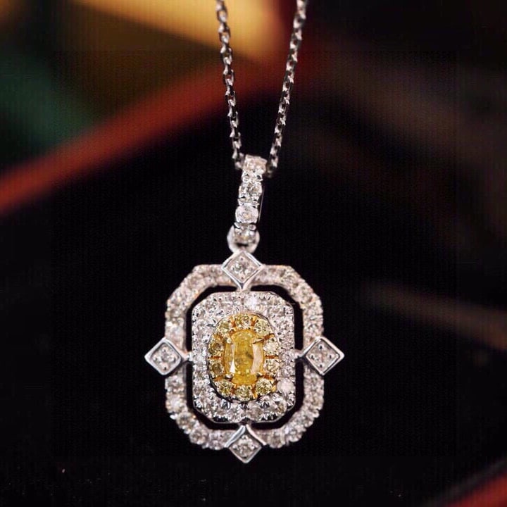 14k Gold 0.45 Ctw Natural Yellow Diamond & Diamond Necklace: Ref:231143145 // gold content:14k gold // main gemstone:yellow diamond // shape:oval // carat weight:0. 12ct // color:yellow // treatment:natural // // adjacent gemstone 2 : diamond // shape:round
