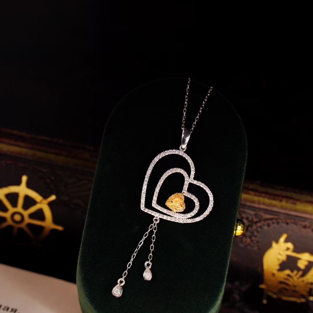 14k Gold 0.6 Ct Natural Color Diamond Necklace: Ref:231143148 // gold content:14k gold // main gemstone:diamond // shape:multiple // carat weight:0. 6ct // clarity grade:vs-si // color:color // treatment:natural // High Estimate: 3000Condition: