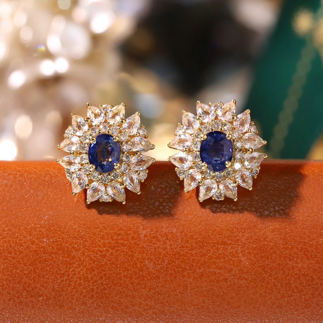 14k Gold 3.16 Ctw Natural Sapphire & Sapphire Earrings: Ref:231143194 // gold content:14k gold // main gemstone:sapphire // shape:oval // carat weight:1. 16ct // color:blue // treatment:natural // // adjacent gemstone 2 : sapphire // shape:pear // carat