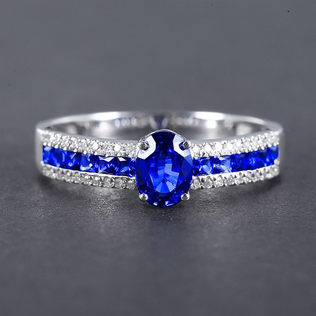 14k Gold 1.31 Ctw Natural Sapphire & Sapphire Ring: Ref:231143230 // gold content:14k gold // ring size:7. 25us // // main gemstone:sapphire // shape:oval // carat weight:0. 8ct // color:blue // treatment:natural // // adjacent gemstone 2 :