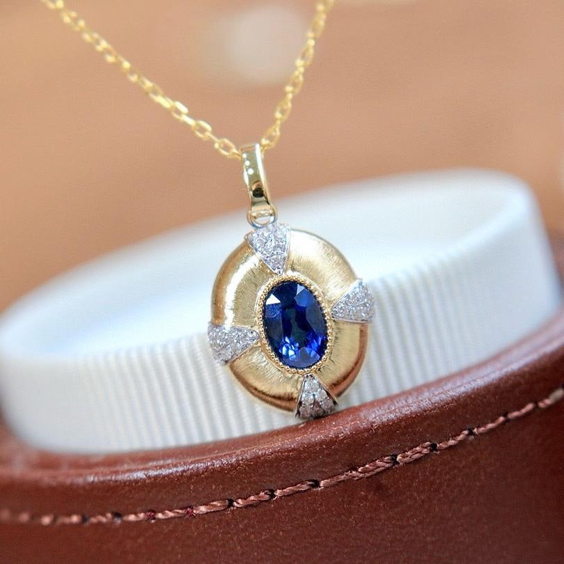 14k Gold 0.72 Ctw Natural Sapphire & Diamond Pendant( Without Chain ): Ref:231143245 // gold content:14k gold // main gemstone:sapphire // shape:oval // carat weight:0. 6ct // color:blue // treatment:natural // // adjacent gemstone 2 : diamond // shape:round // carat