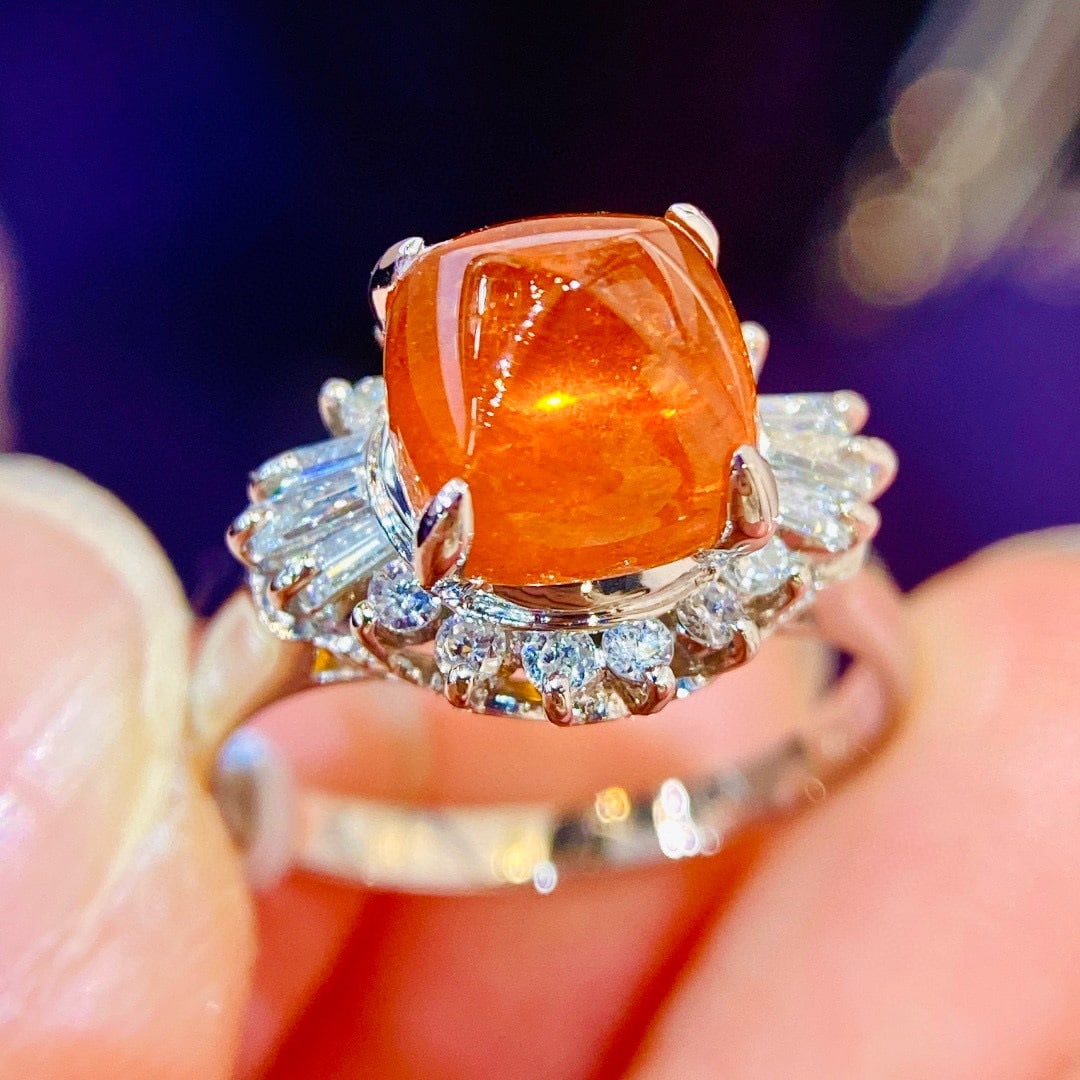 14k Gold 4.73 Ctw Natural Spessartine & Diamond Ring: Ref:231143254 // gold content:14k gold // ring size:7. 25us // // main gemstone:spessartine // shape:sugar-loaf // carat weight:4. 33ct // color:orange // treatment:natural // // adjacent gemstone