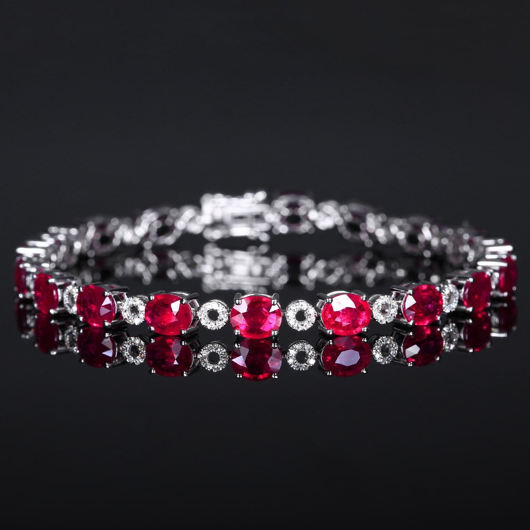 14k Gold 10.01 Ctw Natural Ruby & Diamond Bracelet: Ref:231144002 // gold content:14k gold // main gemstone:ruby // shape:oval // carat weight:9. 58ct // color:red // treatment:natural // // adjacent gemstone 2 : diamond // number of stones:144 //