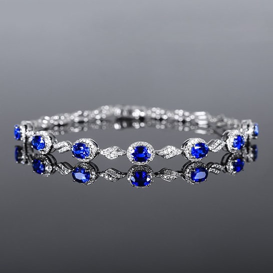 14k Gold 3.05 Ctw Natural Sapphire & Diamond Bracelet: Ref:231144009 // gold content:14k gold // main gemstone:sapphire // shape:oval // carat weight:2. 50ct // color:blue // treatment:natural // // adjacent gemstone 2 : diamond // number of stones:183